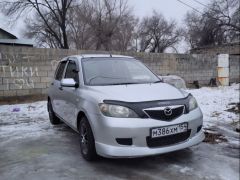 Фото авто Mazda Demio