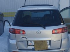 Photo of the vehicle Mazda Demio