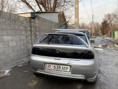 Сүрөт унаа Mazda 323