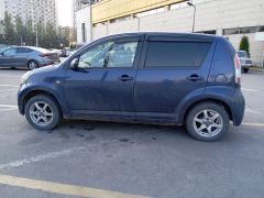 Сүрөт унаа Toyota Passo