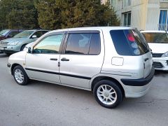 Сүрөт унаа Toyota Raum