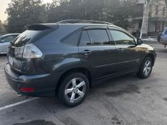 Photo of the vehicle Lexus RX