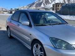 Сүрөт унаа Mitsubishi Lancer