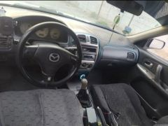 Photo of the vehicle Mazda 323