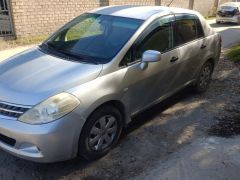 Photo of the vehicle Nissan Tiida