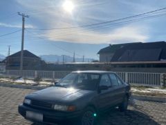 Сүрөт унаа Mazda 323