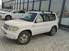 Сүрөт унаа Mitsubishi Pajero iO