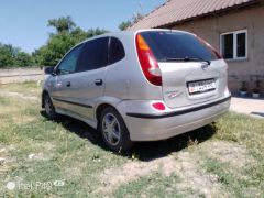 Фото авто Nissan Almera Tino