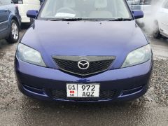 Photo of the vehicle Mazda Demio