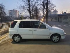 Фото авто Toyota Raum