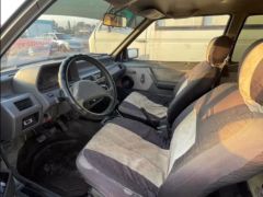 Сүрөт унаа Nissan Micra