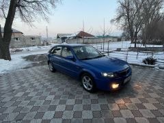 Фото авто Mazda 323