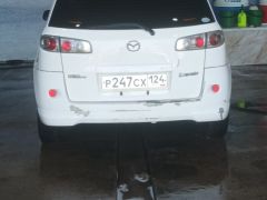 Photo of the vehicle Mazda Demio