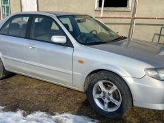 Фото авто Mazda 323