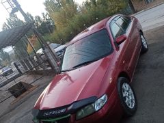 Фото авто Mazda 626