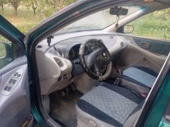 Сүрөт унаа Nissan Almera Tino