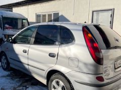 Photo of the vehicle Nissan Almera Tino