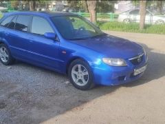 Сүрөт унаа Mazda 323