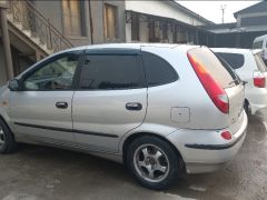 Фото авто Nissan Almera Tino