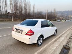 Фото авто Nissan Tiida