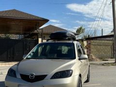 Photo of the vehicle Mazda Demio