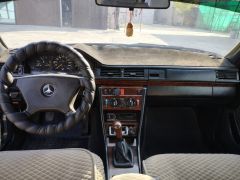 Сүрөт унаа Mercedes-Benz W124