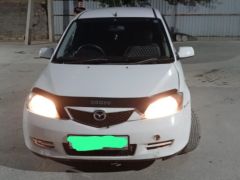 Фото авто Mazda Demio