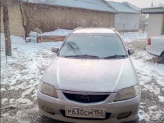 Сүрөт унаа Mazda Familia