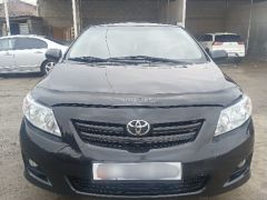 Photo of the vehicle Toyota Corolla