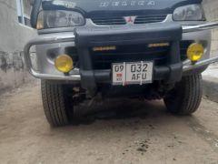 Сүрөт унаа Mitsubishi Delica