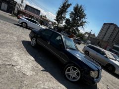 Сүрөт унаа Mercedes-Benz W124