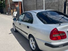 Сүрөт унаа Mitsubishi Carisma