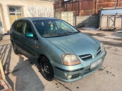 Photo of the vehicle Nissan Almera Tino