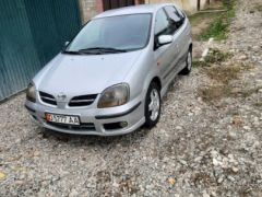 Photo of the vehicle Nissan Almera Tino