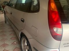 Фото авто Nissan Almera Tino