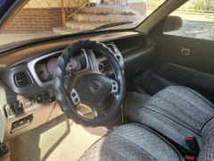 Сүрөт унаа Daihatsu Sirion