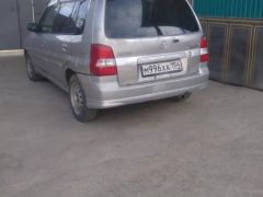 Photo of the vehicle Mazda Demio