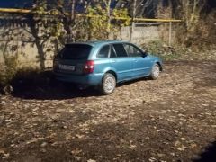 Photo of the vehicle Mazda 323