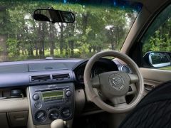 Photo of the vehicle Mazda Demio