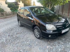 Фото авто Nissan Almera Tino