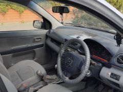 Сүрөт унаа Mazda Demio