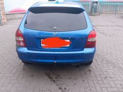 Photo of the vehicle Mazda 323