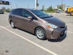 Фото авто Toyota Prius v (+)