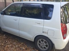 Сүрөт унаа Mitsubishi Dingo