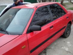 Сүрөт унаа Mazda 323