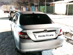 Photo of the vehicle Honda Fit Aria