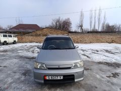 Photo of the vehicle Nissan Cube