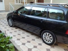 Сүрөт унаа Toyota Corolla