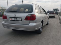 Photo of the vehicle Nissan Primera