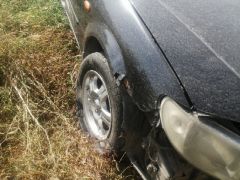 Photo of the vehicle Mazda 323